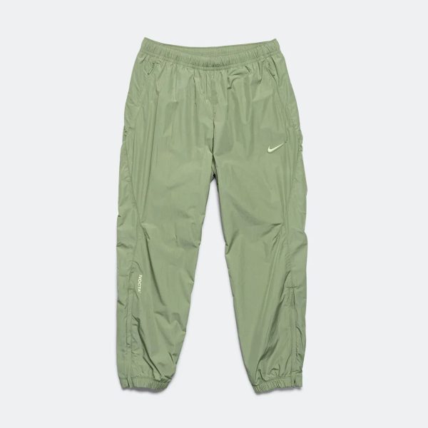 d99345_12144-1.jpg Nike x NOCTA Woven Track Pants Green - Image 1